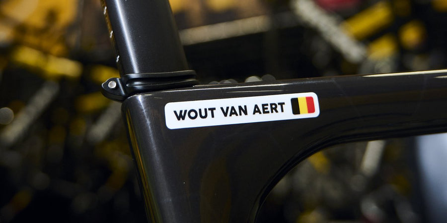 Wout van Aert’s name sticker on his bike in the workshop, among the team bikes